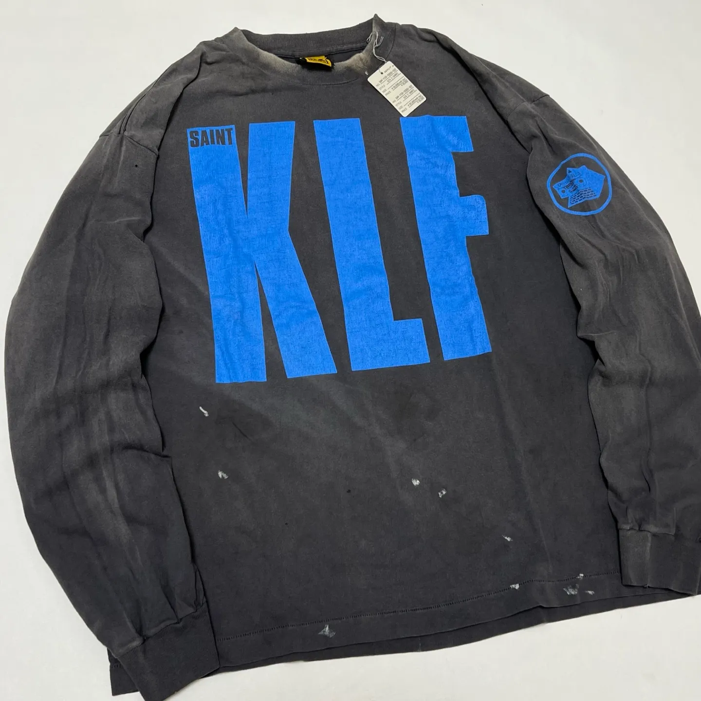 SAINT Mxxxxxx × The KLF BLUE KLF_LS TEE KLF/BLK Blue KLF tape recorder long sleeves Washed black S-XL Completely aligned Tube weaving fabric without side seams Garment dyeing Macau water fading and distressing Simulated sun washing and fading treatment Natural and perfect fading Hand-made holes and fraying Ink splashing treatment Correct main mark/wash mark/cherub anti-counterfeiting mark
